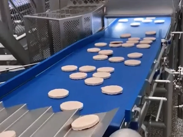 Stacking 1.000 hamburger patties per minute | Niverplast